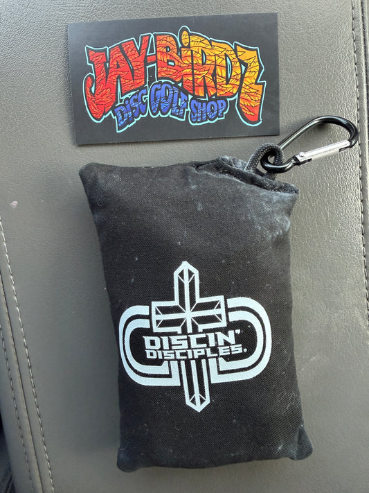 Black chalk sack with Discin’ Disciples logo and a keychain